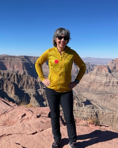Laura standing near the Grand Canyon