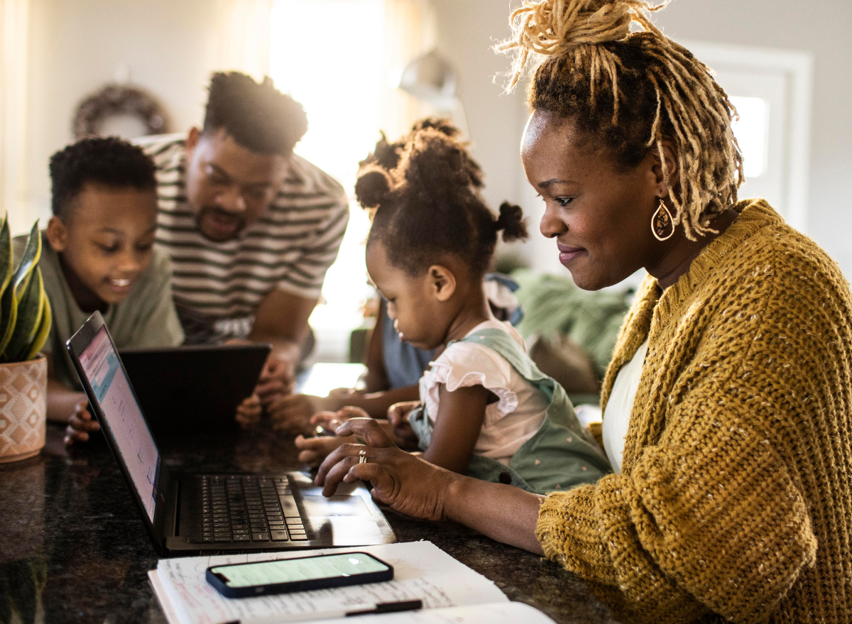 Woman with her family on a variety of internet devices