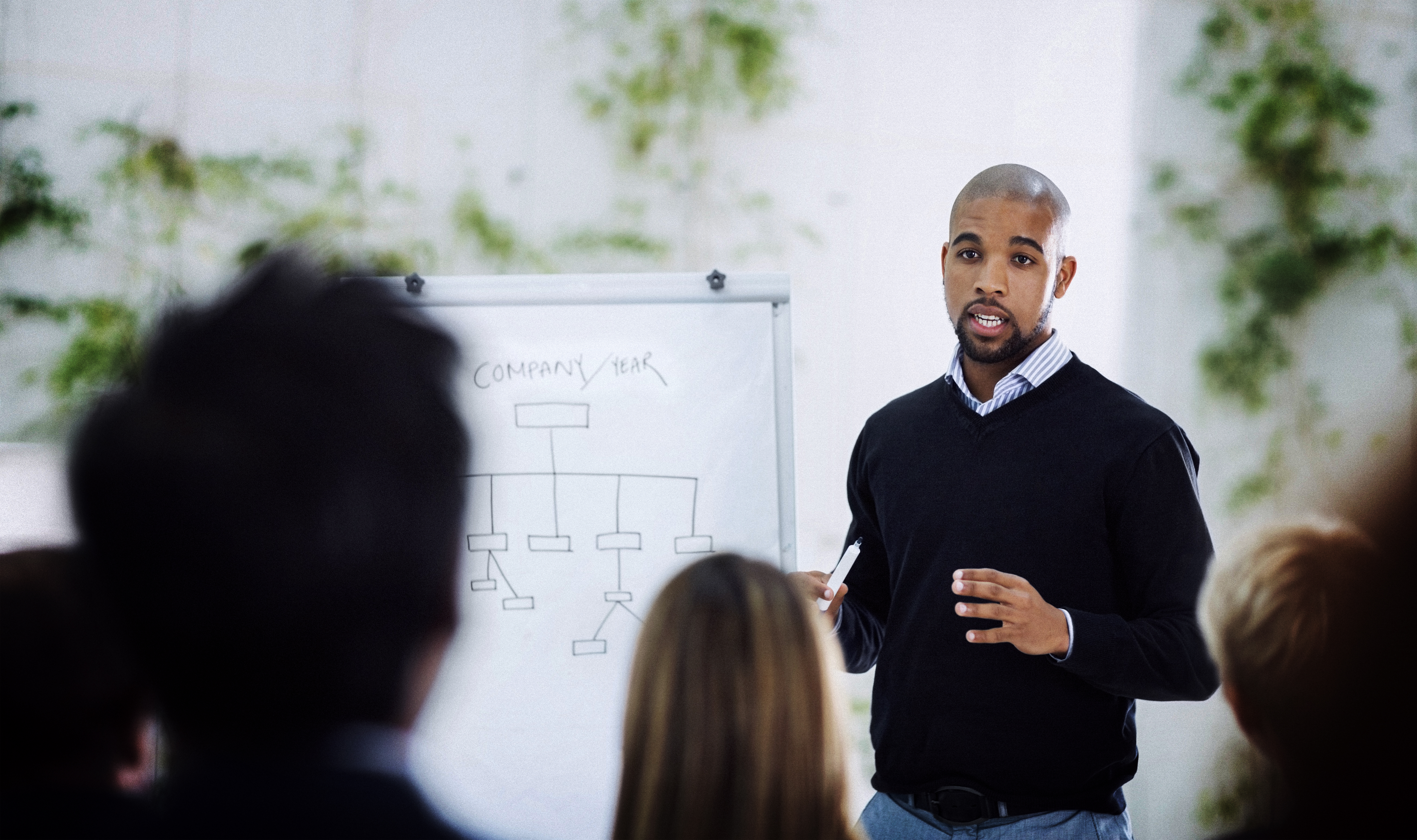 Man teaching in front of class